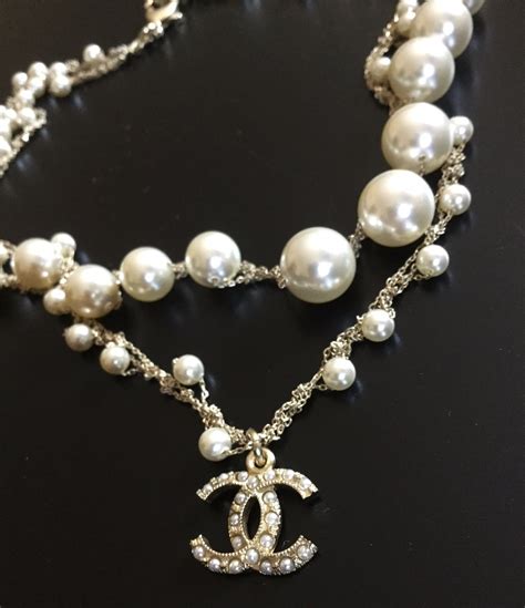 chanel pearl necklace with cc logo replica|chanel cc logo pendant necklace.